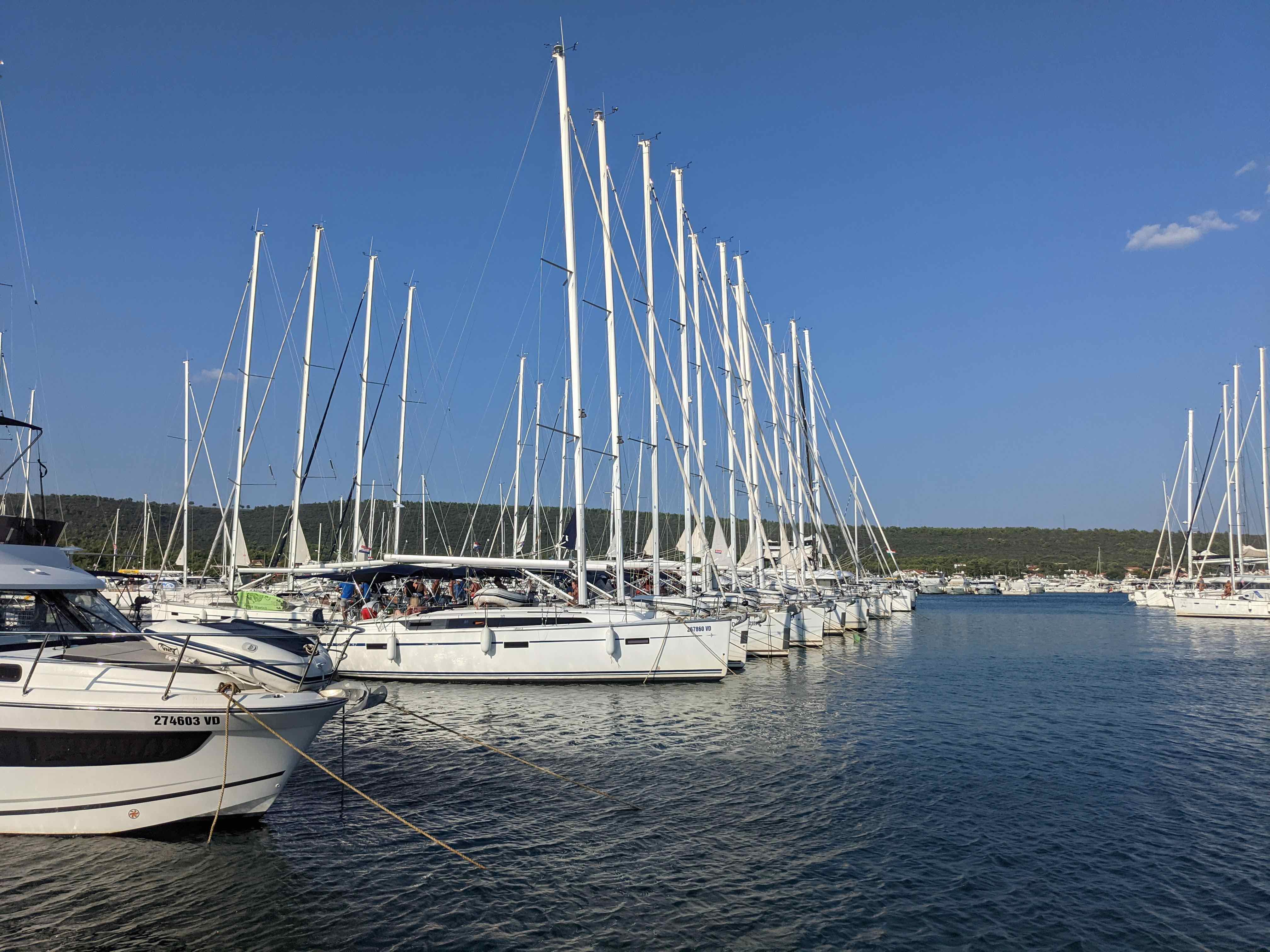 Marina full of med-style docked sailboats